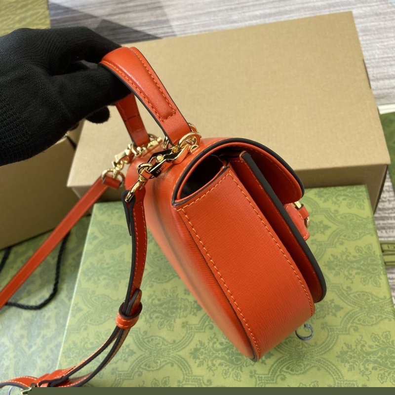 G*u*i top handle bags